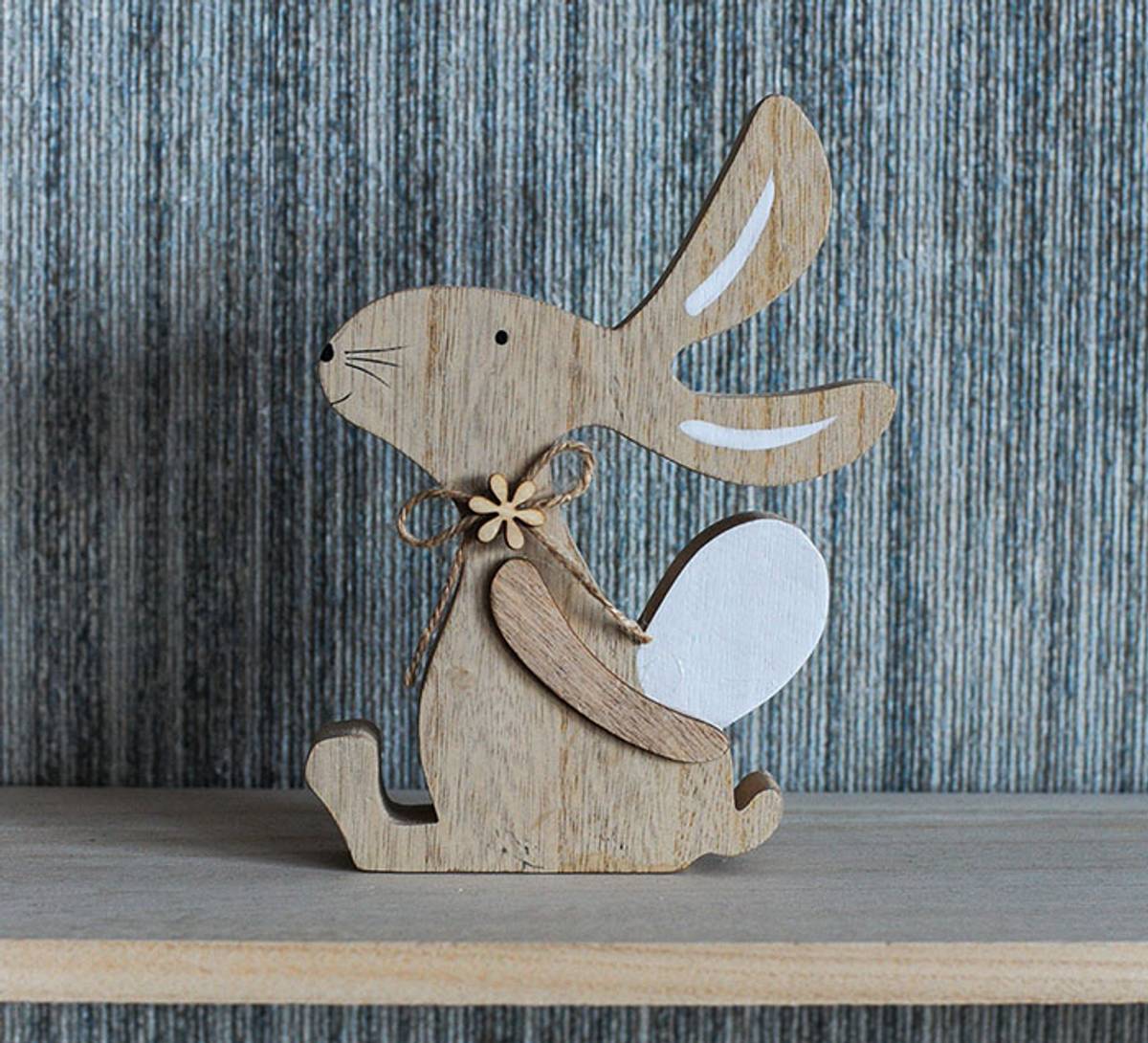 Sitting hare with Easter eggs on its back